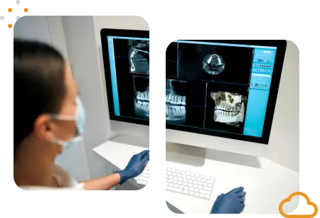 Mulher com máscara e luvas analisa uma radiografia odontológica no computador