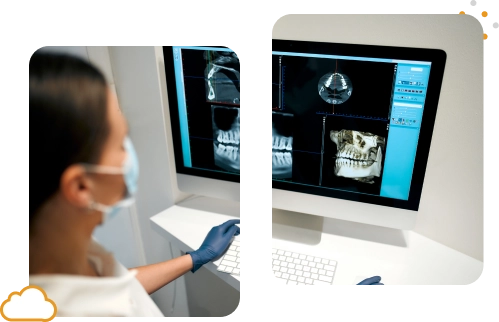Una mujer con mascarilla y guantes analiza una radiografía dental en la computadora